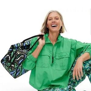 Diane Von Furstenberg Green travel windbreaker.